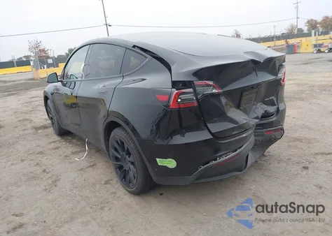 2023 Tesla Model Y Awd/Long Range Dual Motor All-Wheel Drive z USA, uszkodzony, nr VIN 7SAYGDEE8PA101552
